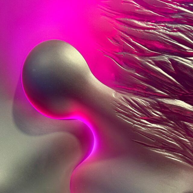 What does this glass sculpture remind you of? An angel in the wind, an abstract figure, or is it the intense pink color…